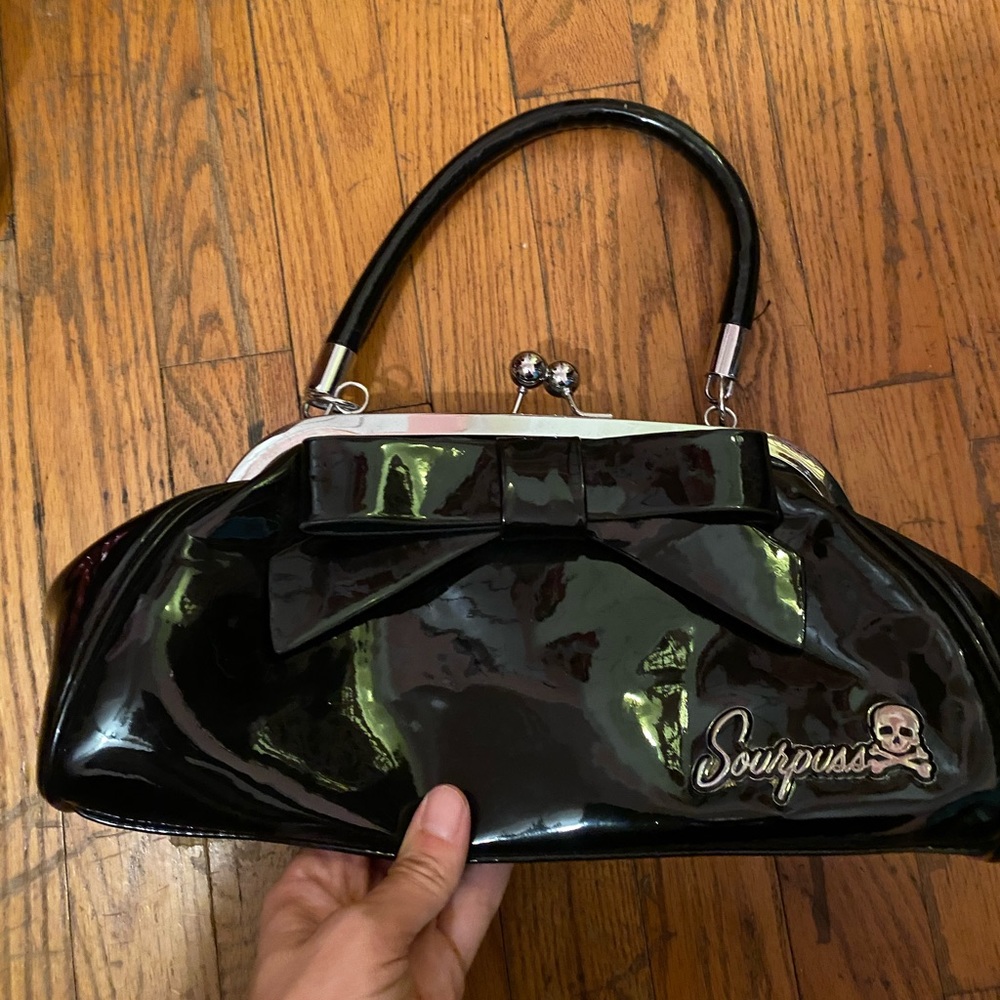 Sourpuss purse